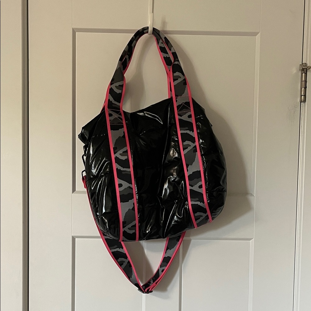HAUTE SHORE Glossy Black Bag with Pink Straps